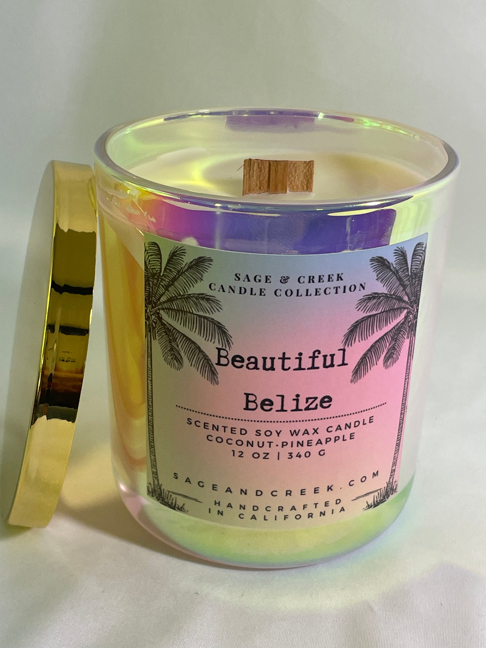 This candle is just as exotic and tropical as the beautiful vacation island of Belize. It boasts of vacation scents like coconut, pineapple, lemon, sugared rum and rich vanilla embodied in our natural soy wax. Light and enjoy 40+ hours of burn time. Hand crafted with love and care in California. 